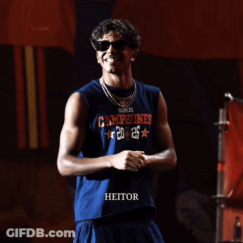 Young Man In Sunglasses And Campeones Shirt GIF