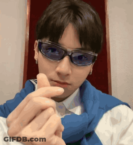 Young Man In Sunglasses Making Heart GIF