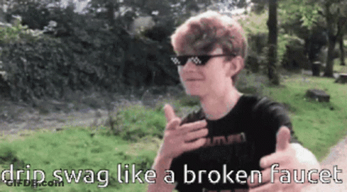 Young Man In Sunglasses Thumbs Up Saying Drip Swag Like A Broken Faucet GIF