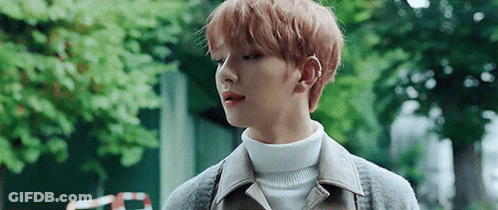 Young Man In Turtleneck And Jacket GIF