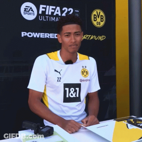 Young Man In White And Yellow Jersey With 1 & 1 GIF