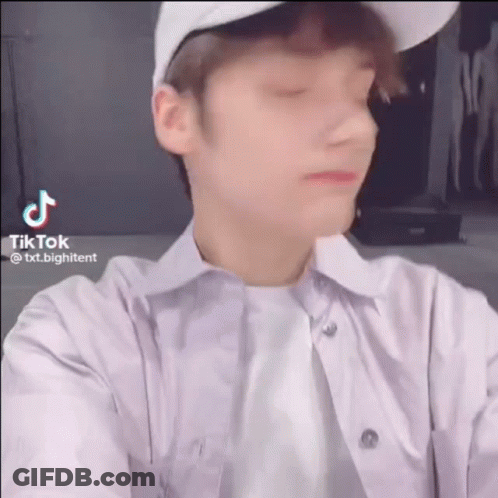 Young Man In White Hat Making Funny Face GIF