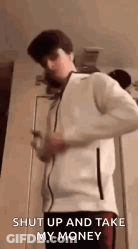 Young Man In White Jacket At Door GIF