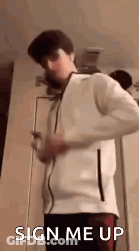 Young Man In White Jacket Saying Sign Me Up GIF