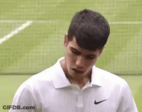 Young Man In White Nike Polo On Tennis Court GIF