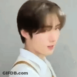 Young Man In White Shirt And Brown Tie GIF