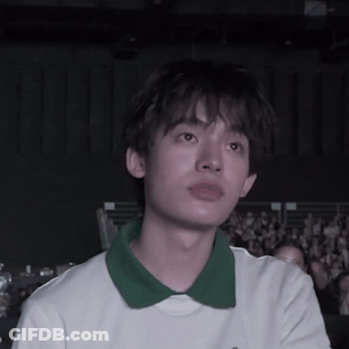 Young Man In White Shirt And Green Collar GIF