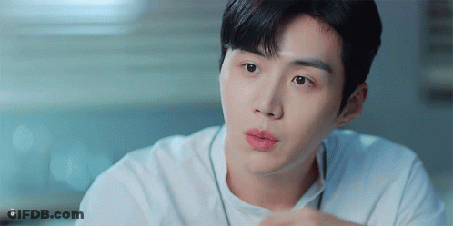 Young Man In White Shirt And Red Lipstick GIF