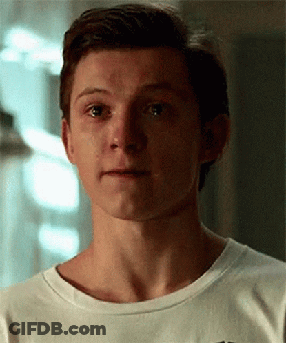 Young Man In White Shirt Close Up GIF