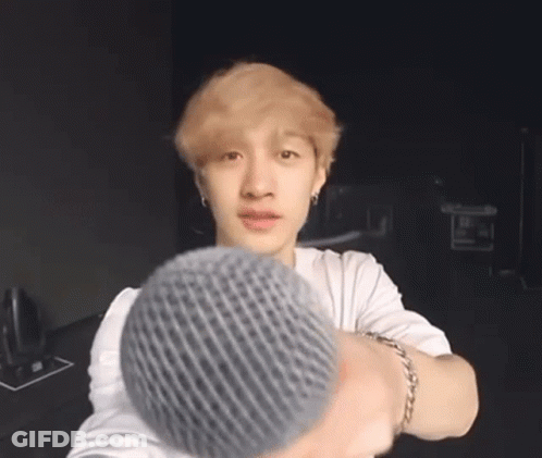 Young Man In White Shirt Grey Beanie Taking Selfie GIF