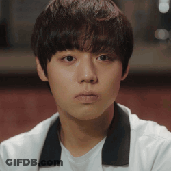 Young Man In White Shirt With Black Collar GIF