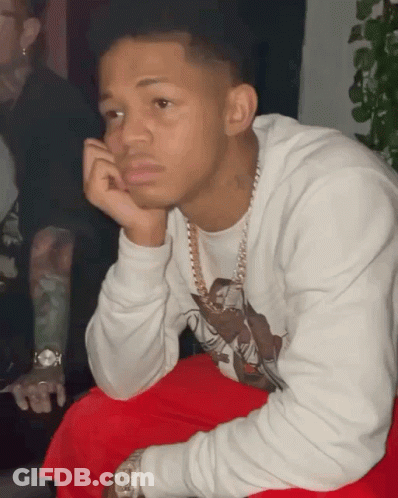 Young Man In White Sweatshirt And Red Pants GIF