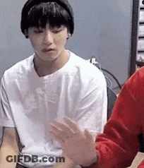 Young Man In White T-Shirt And Black Headband GIF