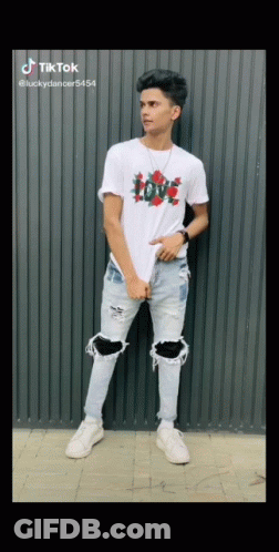 Young Man In White T-Shirt And Ripped Jeans GIF