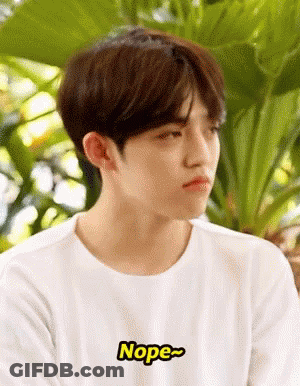 Young Man In White T-Shirt Saying Nope GIF