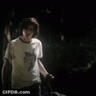 Young Man In White T-Shirt With Wolf GIF