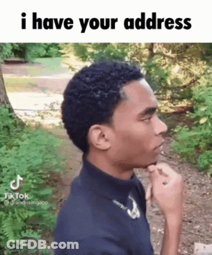 Young Man In Woods With Hand On Chin Saying I Have Your Address GIF