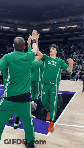 Young Man In Yellow Bears Jersey In Front Of Green Bleachers GIF