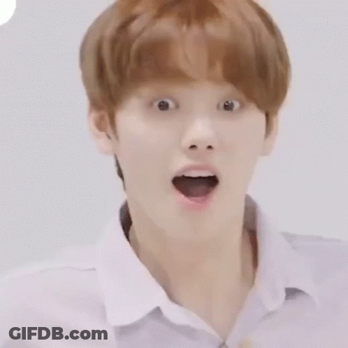 Young Man In Yellow Hoodie Making Funny Face GIF