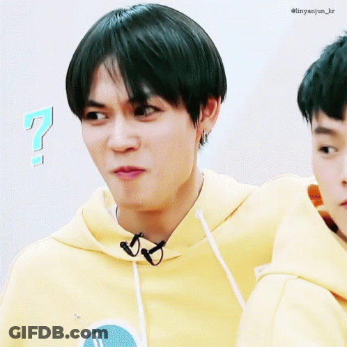 Young Man In Yellow Hoodie Making Funny Face GIF