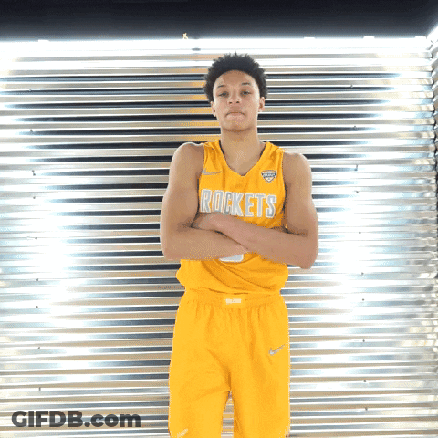 Young Man In Yellow Rockets Jersey Arms Crossed GIF