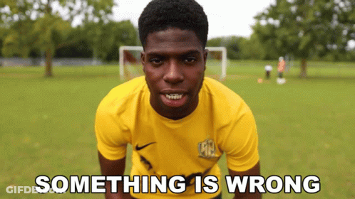 Young Man In Yellow Shirt Saying Something Is Wrong GIF