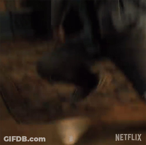Young Man Kneeling On Floor GIF