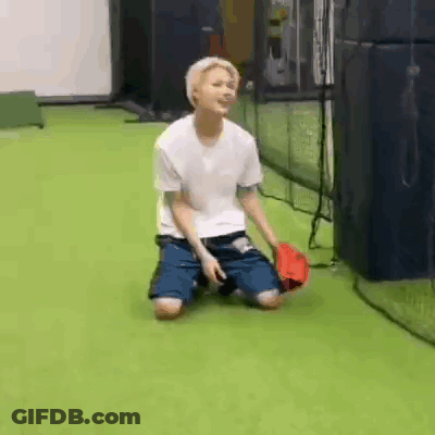 Young Man Kneeling With Baseball Glove GIF