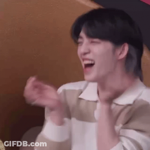 Young Man Laughing And Clapping Hands GIF