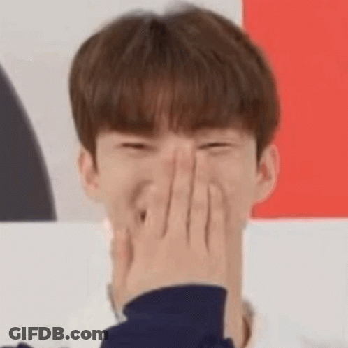 Young Man Laughing And Covering Face GIF