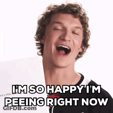 Young Man Laughing Saying I'm So Happy I'm Peeing Right Now GIF
