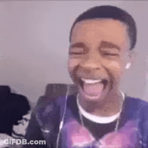 Young Man Laughing Tongue Out Headphones Purple Shirt GIF