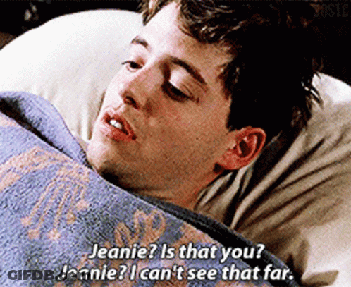 Young Man Laying In Bed With Blue Blanket Saying Jeanie Is That You GIF