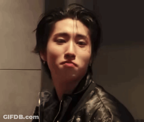 Young Man Making Face In Leather Jacket GIF
