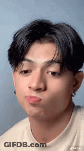 Young Man Making Funny Face GIF