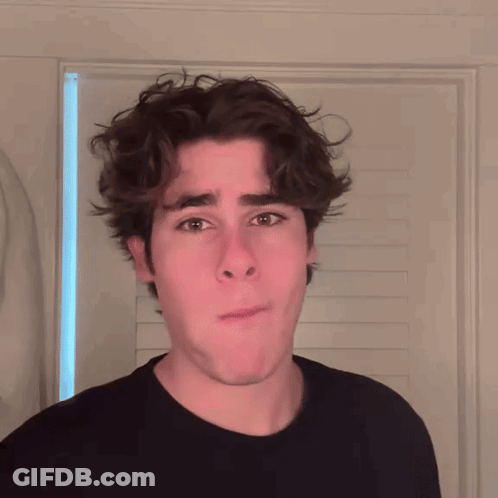 Young Man Making Funny Face GIF
