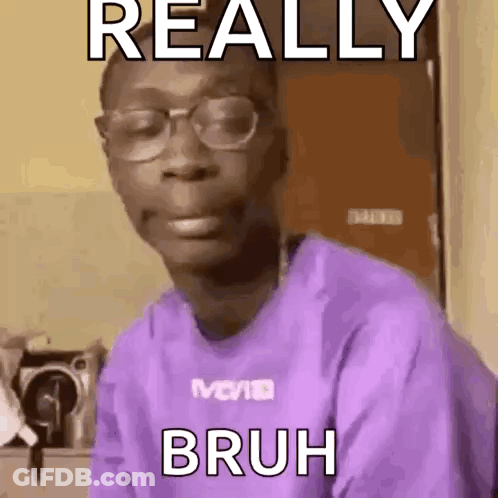 Young Man Making Funny Face Glasses Purple Shirt GIF