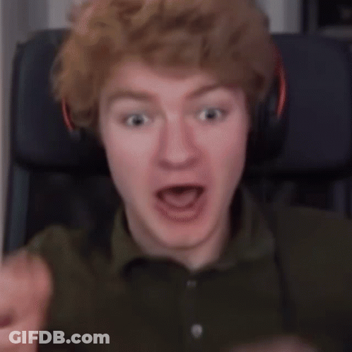 Young Man Making Funny Face Hands On Head GIF