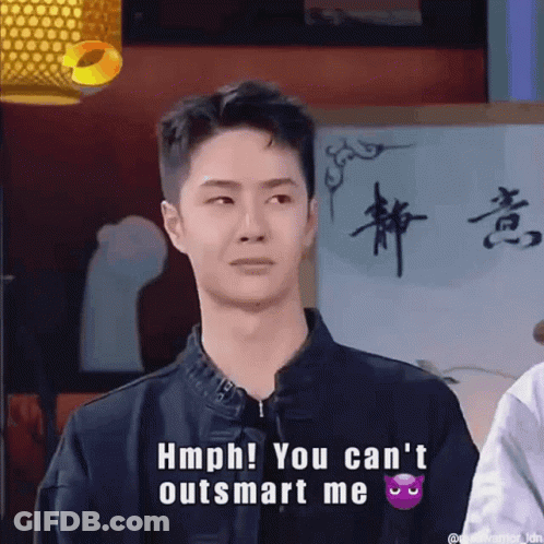 Young Man Making Funny Face Hmph You Can't Outsmart Me GIF