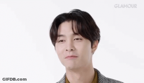 Young Man Making Funny Face In Jacket GIF
