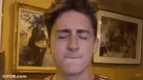 Young Man Making Funny Face GIF