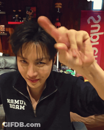 Young Man Making Funny Face Saying Clocked GIF
