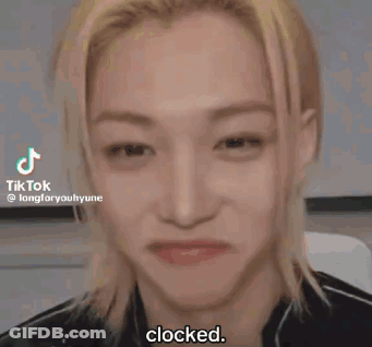 Young Man Making Funny Face Saying Clocked GIF