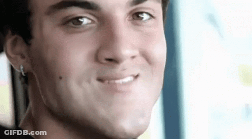 Young Man Making Funny Face Smiling GIF