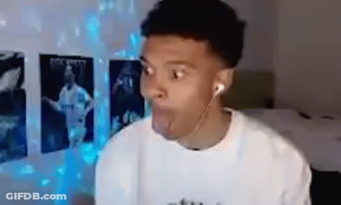 Young Man Making Funny Face With Headphones GIF