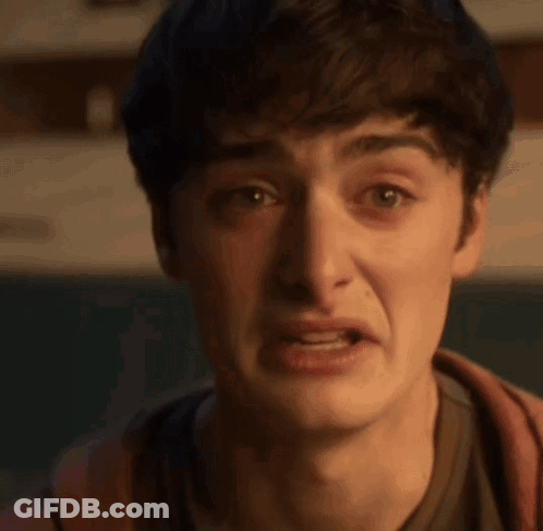 Young Man Making Funny Face With Mouth Open Eyes Closed GIF