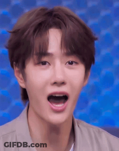 Young Man Making Funny Face With Mouth Open GIF