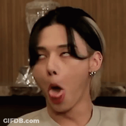 Young Man Making Funny Face With Tongue Out GIF