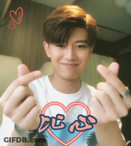 Young Man Making Heart Shape With I Love You Sticker GIF
