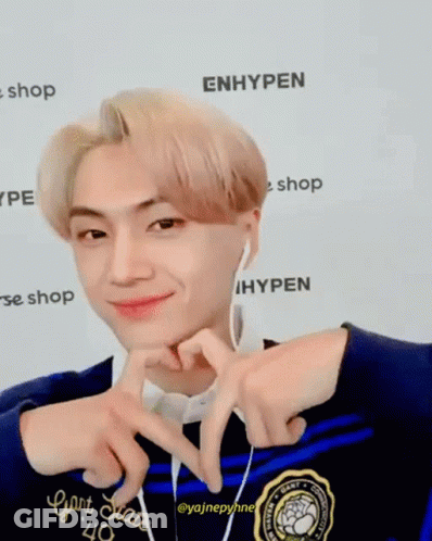 Young Man Making Heart With Fingers GIF